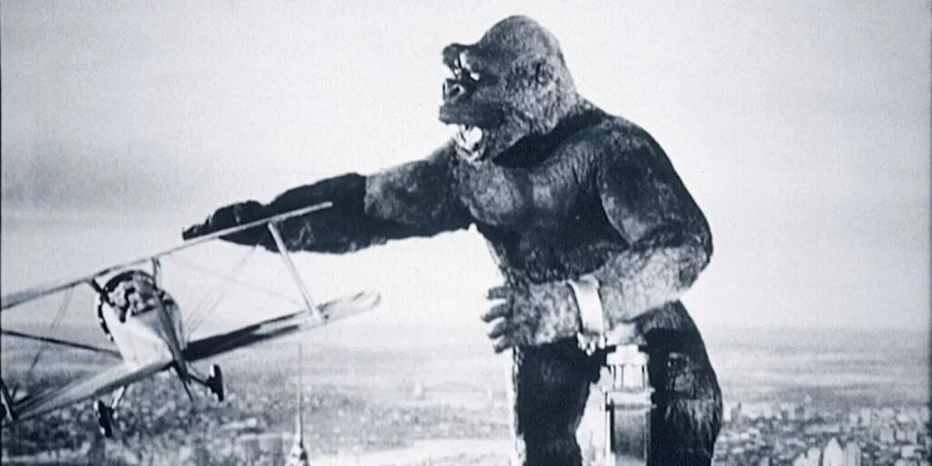 King Kong tries to grab a plane as it attacks him atop the Empire State building. Kong swats at a biplane in a stop motion scene from 1933's King Kong. The stop motion scenes are the first well known in the history of animation.